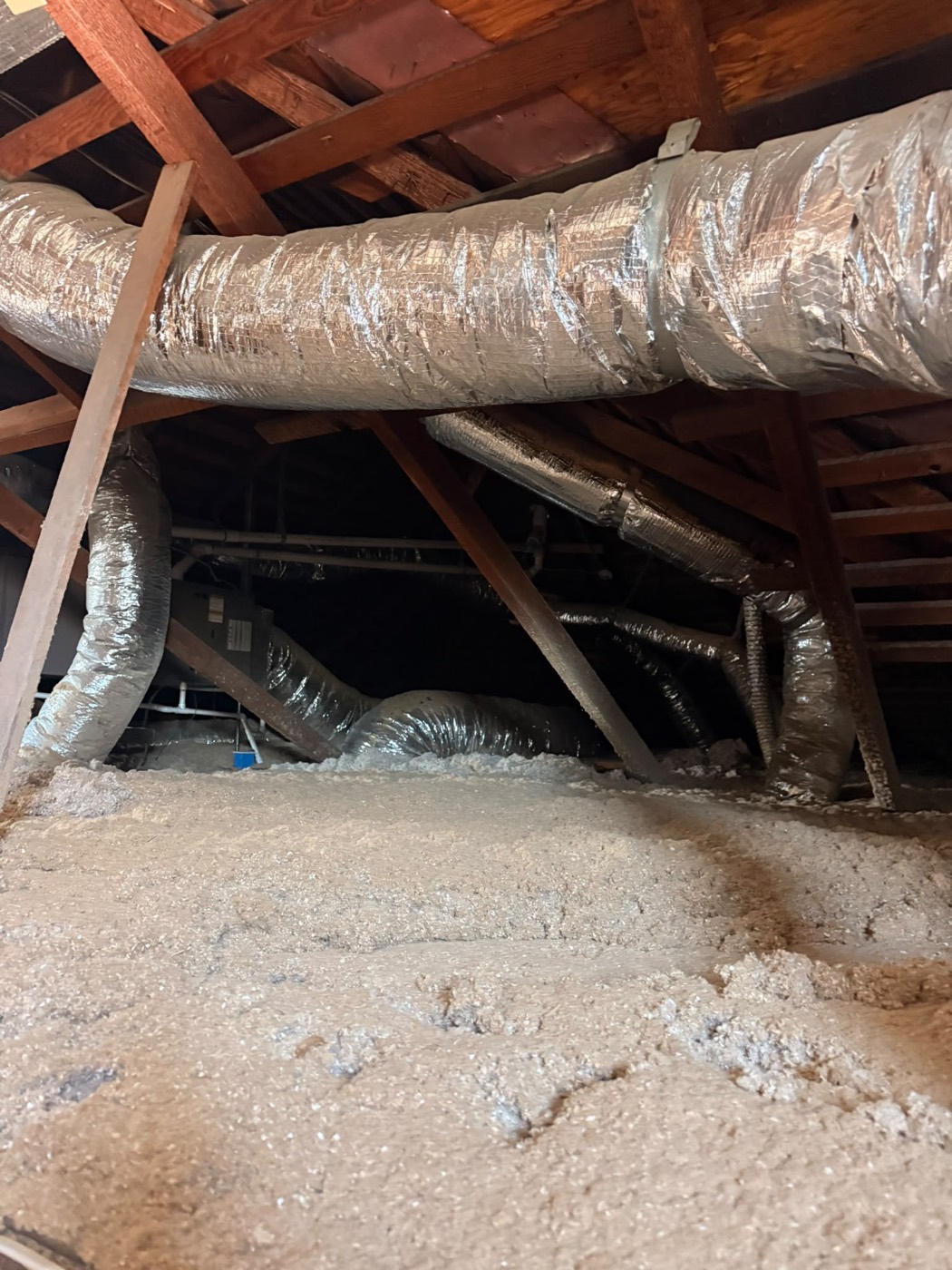 Attic ductwork and fresh insulation installed in Los Angeles home