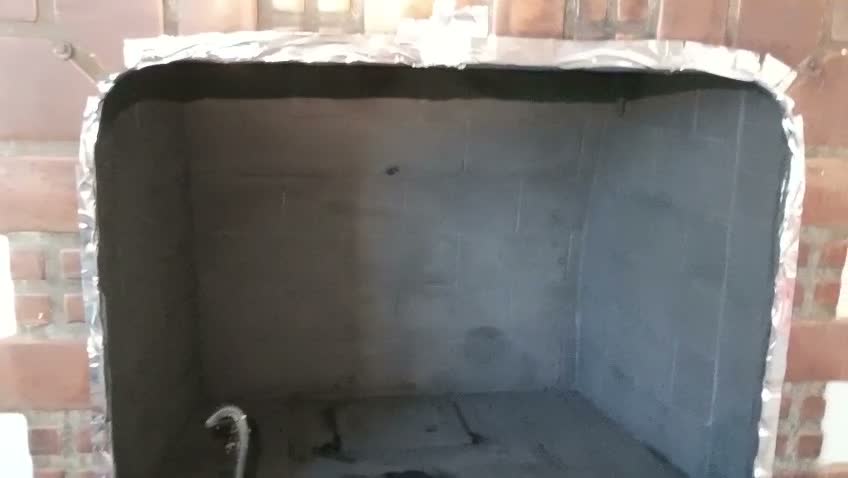 Cleaned fireplace chamber ready for final inspection